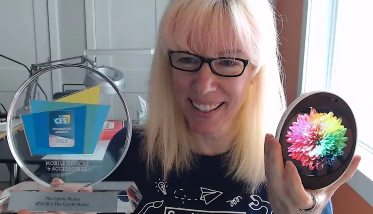 image of Christine holding circle phone